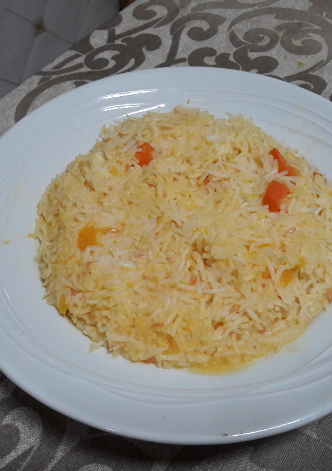Una foto de 🇮🇹Risotto de arroz basmati y calabaza vegano 🍚