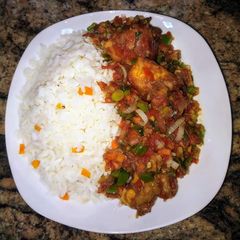A picture of Boiled rice and vegetable stew.