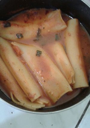 Una foto de Canelones con queso