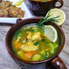 A picture of Supreme chicken veg soup with classic potatoes puffs.