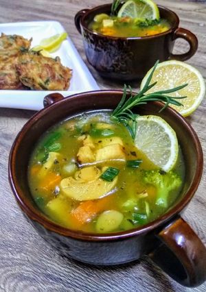 A picture of Supreme chicken veg soup with classic potatoes puffs.