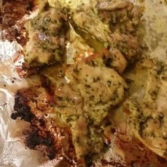 A picture of Pesto baked chicken thighs.