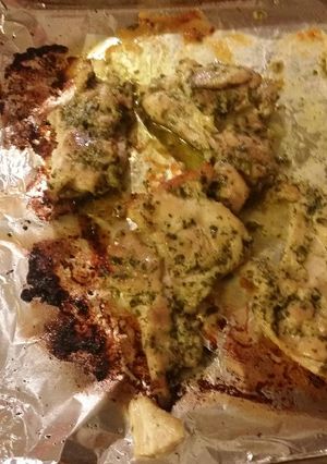 A picture of Pesto baked chicken thighs.