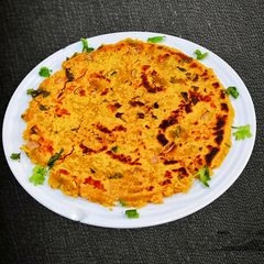 A picture of Leftover Diwali Chivda Thalipith.