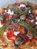 Pizza con masa base de pollo