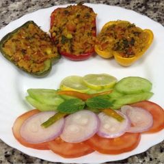 A picture of Baked Soya Stuffed Capsicum Cups { A dish with lots of color}.