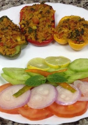 A picture of Baked Soya Stuffed Capsicum Cups { A dish with lots of color}.
