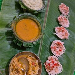 A picture of Vegetable Sambar Idiyappam.