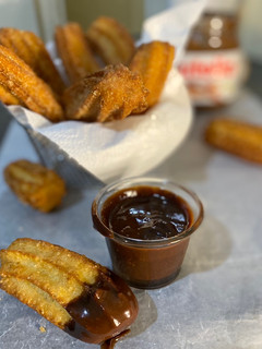 A picture of Mixed spice and Brown sugar Churros.