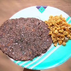 A picture of Ragi rotti with egg burji.