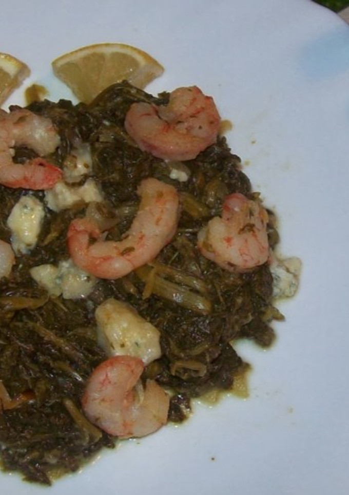 Una foto de Espinacas con queso de Cabrales y gambas
