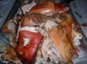 Una foto de Lechón adobado al horno