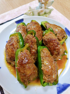 A picture of Stuffed Bell Peppers in Sweet and Savory Sauce.