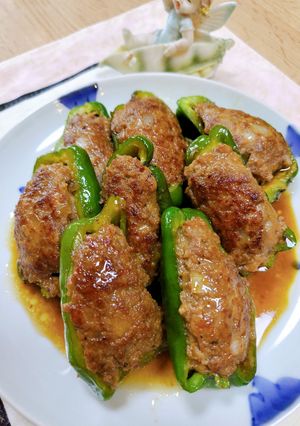 A picture of Stuffed Bell Peppers in Sweet and Savory Sauce.