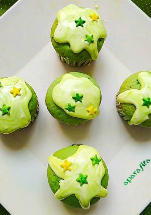 A picture of Spinach cupcakes with egg and chocolate ganache topping.