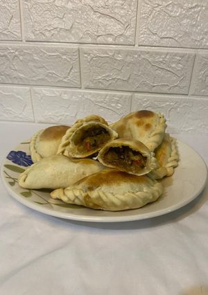 Una foto de Empanadas estilo ratatouille 🥟🐀👩🏻🍳