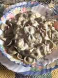 Lacitos en salsa blanca