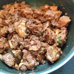 A picture of Chettinad chicken curry.