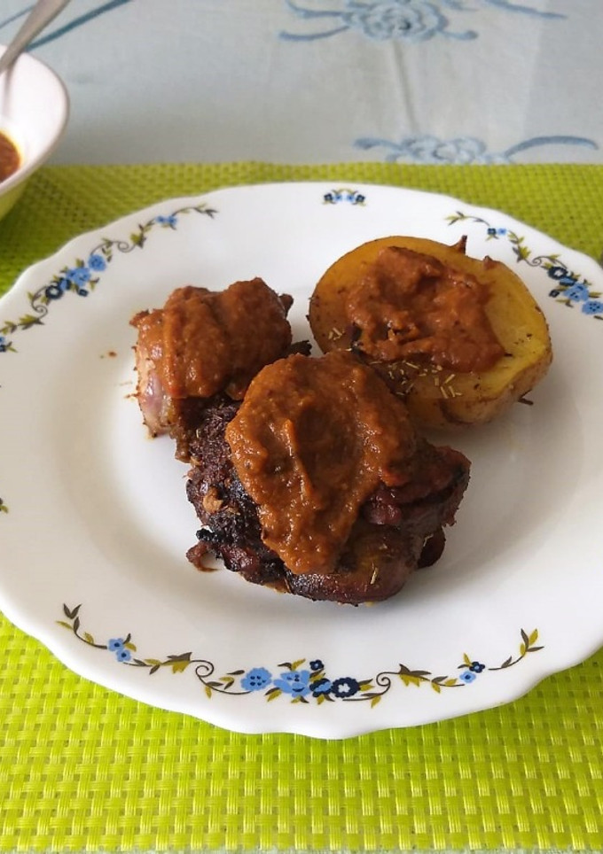 Una foto de Codillo al Curry