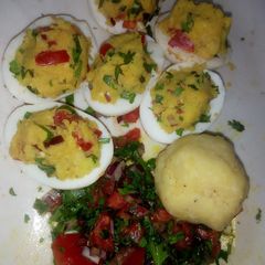 A picture of 'Mayai Mwitu' Deviled Eggs With Uber-Kenyan Kachumbari, Matoke.