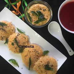 A picture of Carrot Dalia Idli.