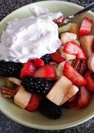A picture of Tricia's Fruit Salad with Coconut Whipped Cream.