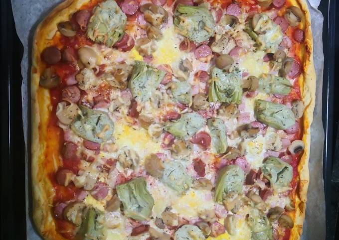 Pizza familiar ??‍?‍?‍? Receta de Ana - Cookpad