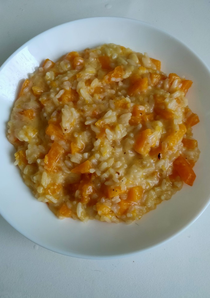 Una foto de Risotto de calabaza y parmesano