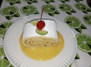 Una foto de Niño envuelto Jelly roll de limón con nuez