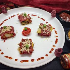 A picture of Beetroot Chana Spinach Cheese Burritos.
