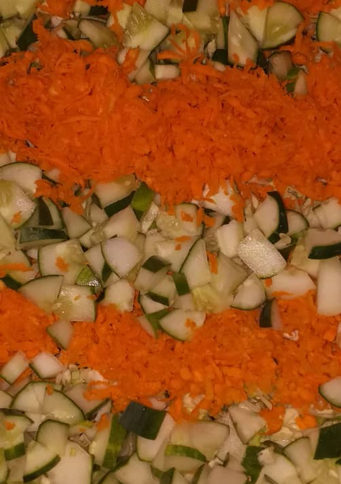 A picture of Carrots and cucumber.