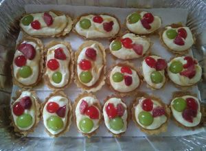 Una foto de Canastitas con Puding y fruta