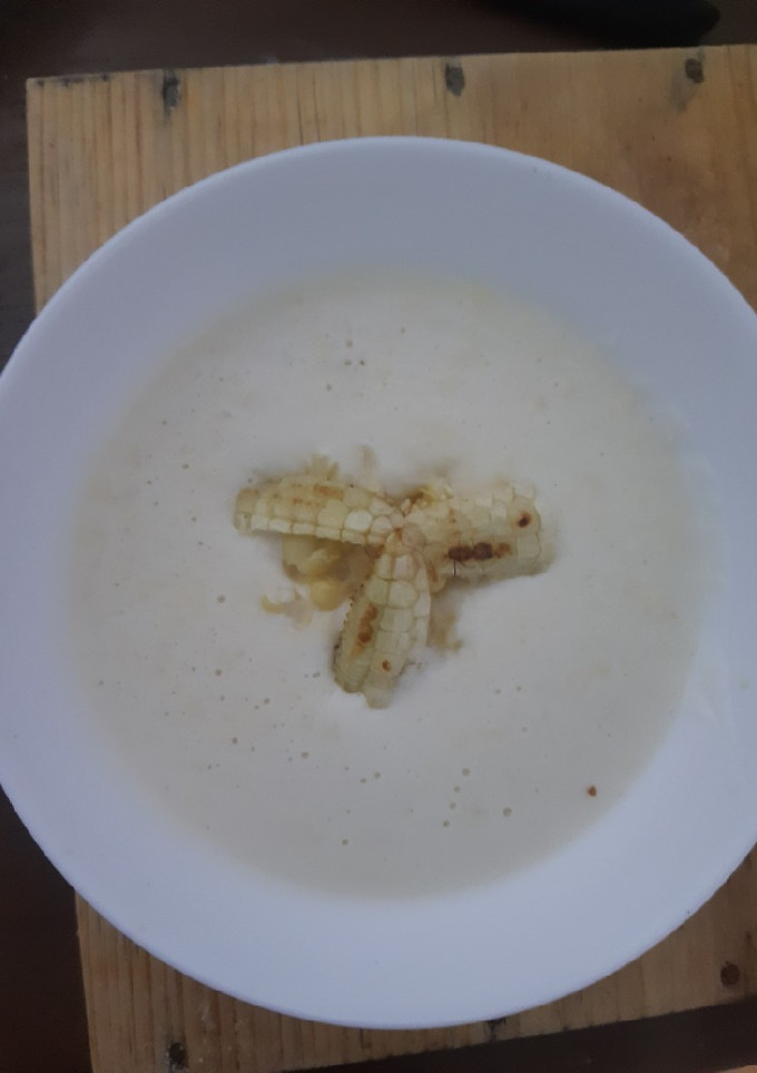 Una foto de Crema templada de maíz y leche de coco