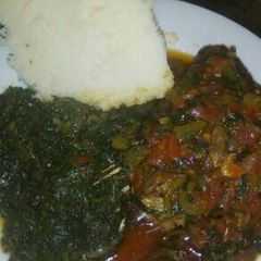 A picture of Sossy soya served with ugali and kales.