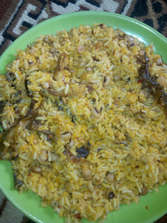 A picture of Jollof rice and beans.