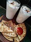Coconut dry fruit shake with sattu paratha