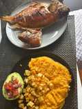 Barrel-Grilled Mojarra with Creamy Pumpkin, Crispy Potatoes, and Stuffed Avocado