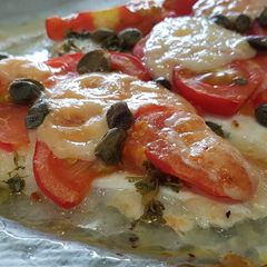A picture of Grilled turbot with Italian-inspired topping.