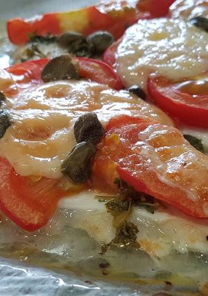 A picture of Grilled turbot with Italian-inspired topping.