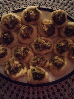 Una foto de Nidos de papas y acelga