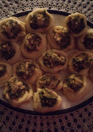 Una foto de Nidos de papas y acelga