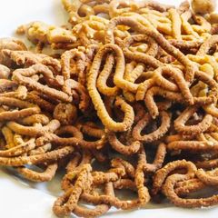 A picture of Low-Glycemic Baked Barley Murukku/thenkuzhal.