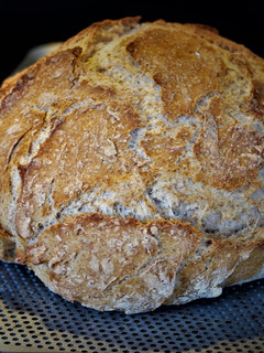 A picture of Semi-Whole Wheat Rye Bread in a Dutch Oven.
