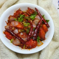 A picture of Chicken Manchurian Schezwan Dry.