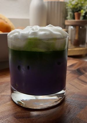 A picture of Ube Matcha Latte with Cold Foam.