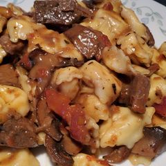 A picture of Braised Beef and Tortellini in Marsala Cream Sauce.