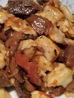 A picture of Braised Beef and Tortellini in Marsala Cream Sauce.