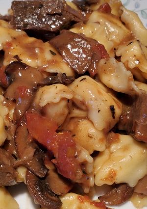 A picture of Braised Beef and Tortellini in Marsala Cream Sauce.