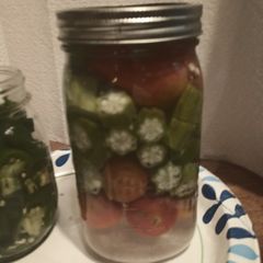 A picture of Pickled Okra and Tomatoes.