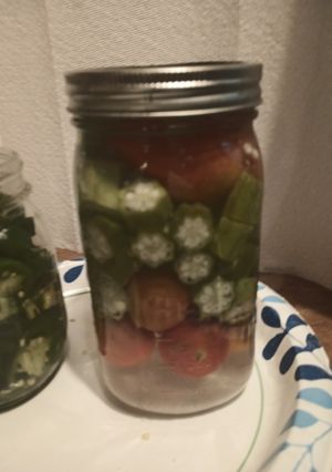 A picture of Pickled Okra and Tomatoes.